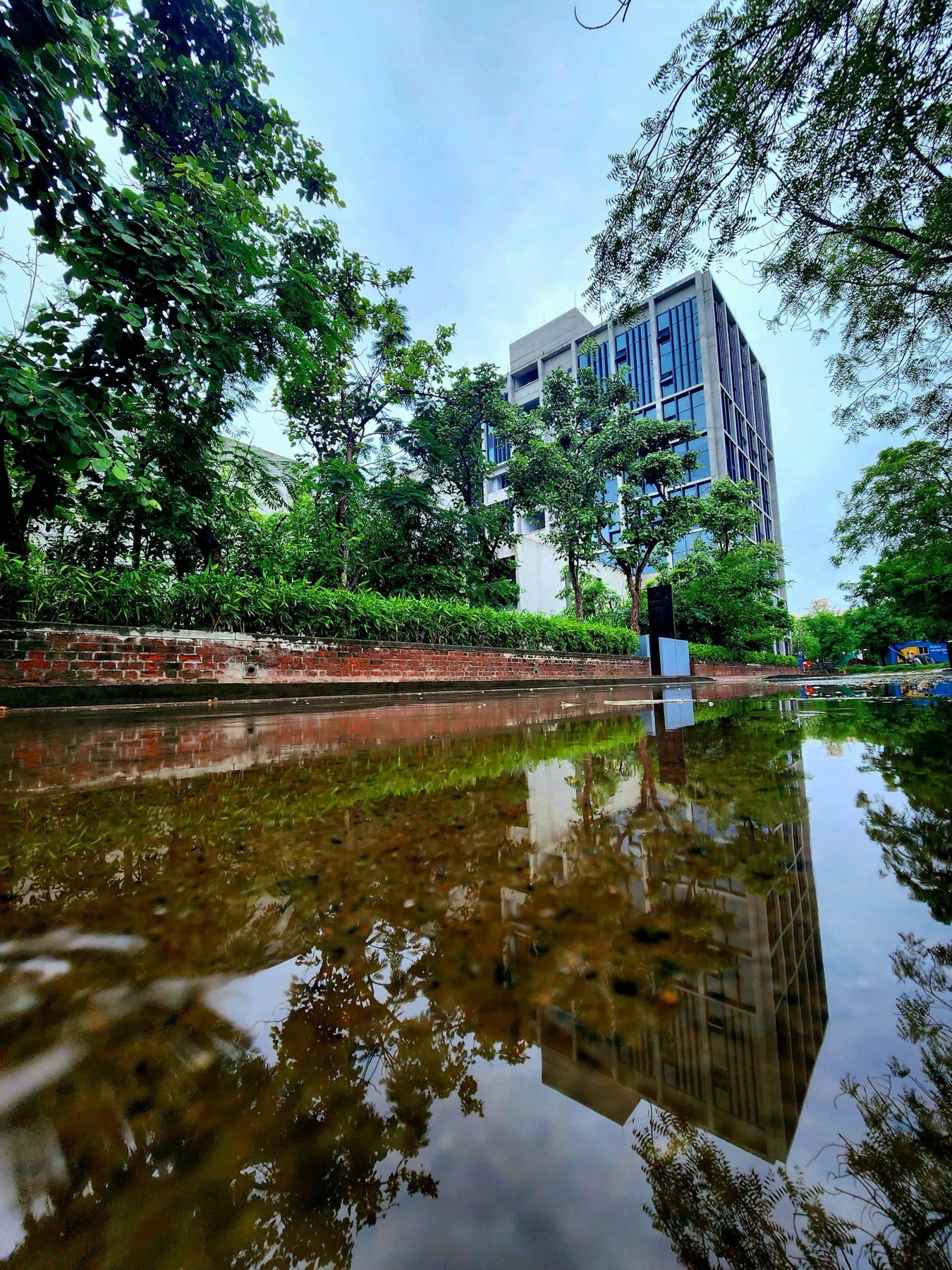 The IIMA Ventures tower reflected after monsoon rain